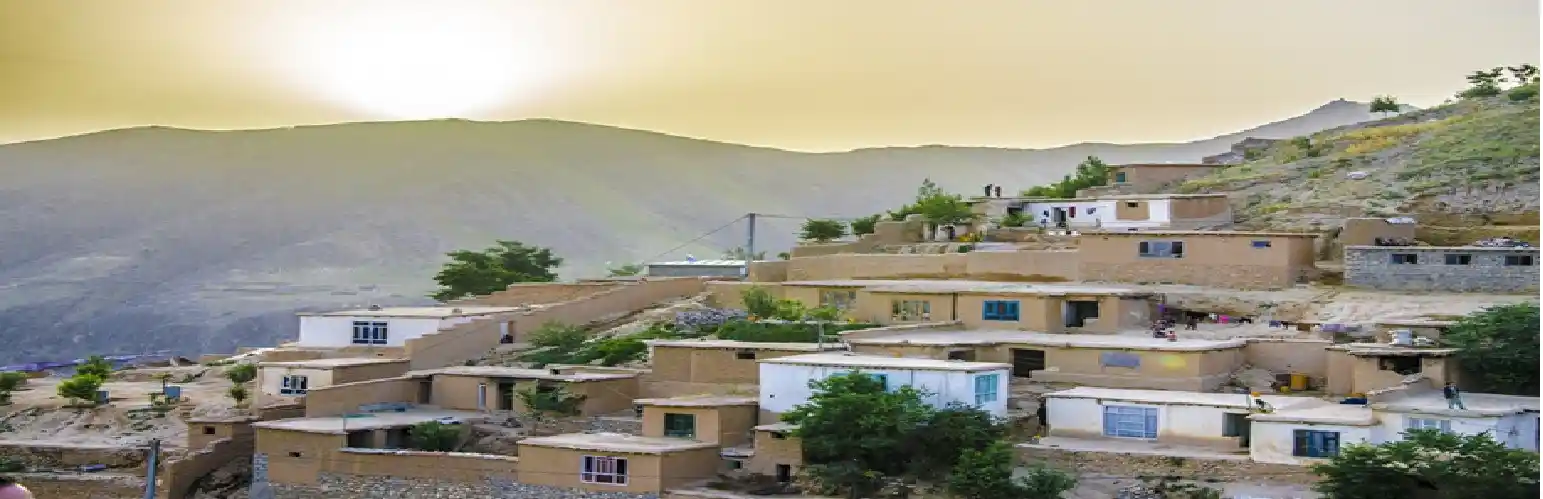 Mountain village in Afghanistan surrounded by rugged peaks
